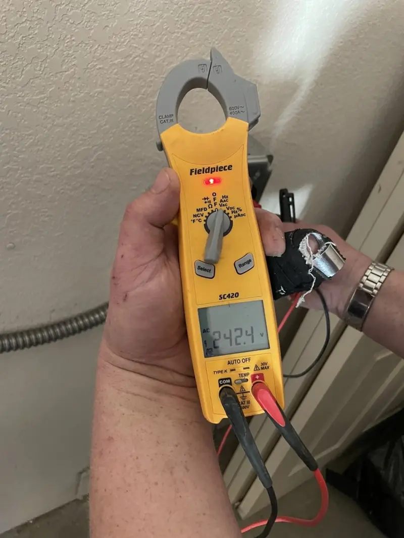 Voltage testing with clamp meter during Aluminum Wiring Replacement in North Olmsted